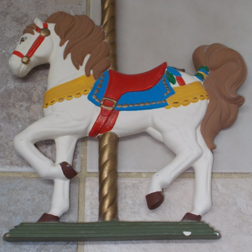 Vintage plaster horse carosel approximately 11 3/4"x10 3/4"